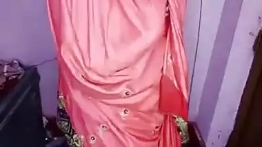 Desi Bhabhi takes boobies to light next to her XXX partner in bed