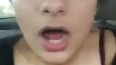 A nude Indian babe drinks her lover’s cum in the car