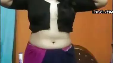 Cute girl stripping saree and showing naked boobs
