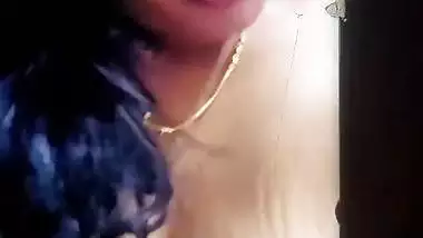 MILF horny expression with big boobs showing