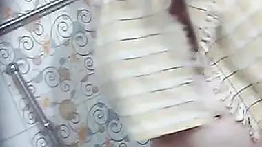 Hairy pussy MILF naked bath recorded by relative