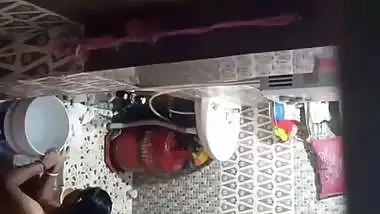 Neighbor aunty taking bath caught by voyeur