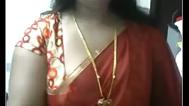 Desi Indian bhabhi exposing large tits for u!